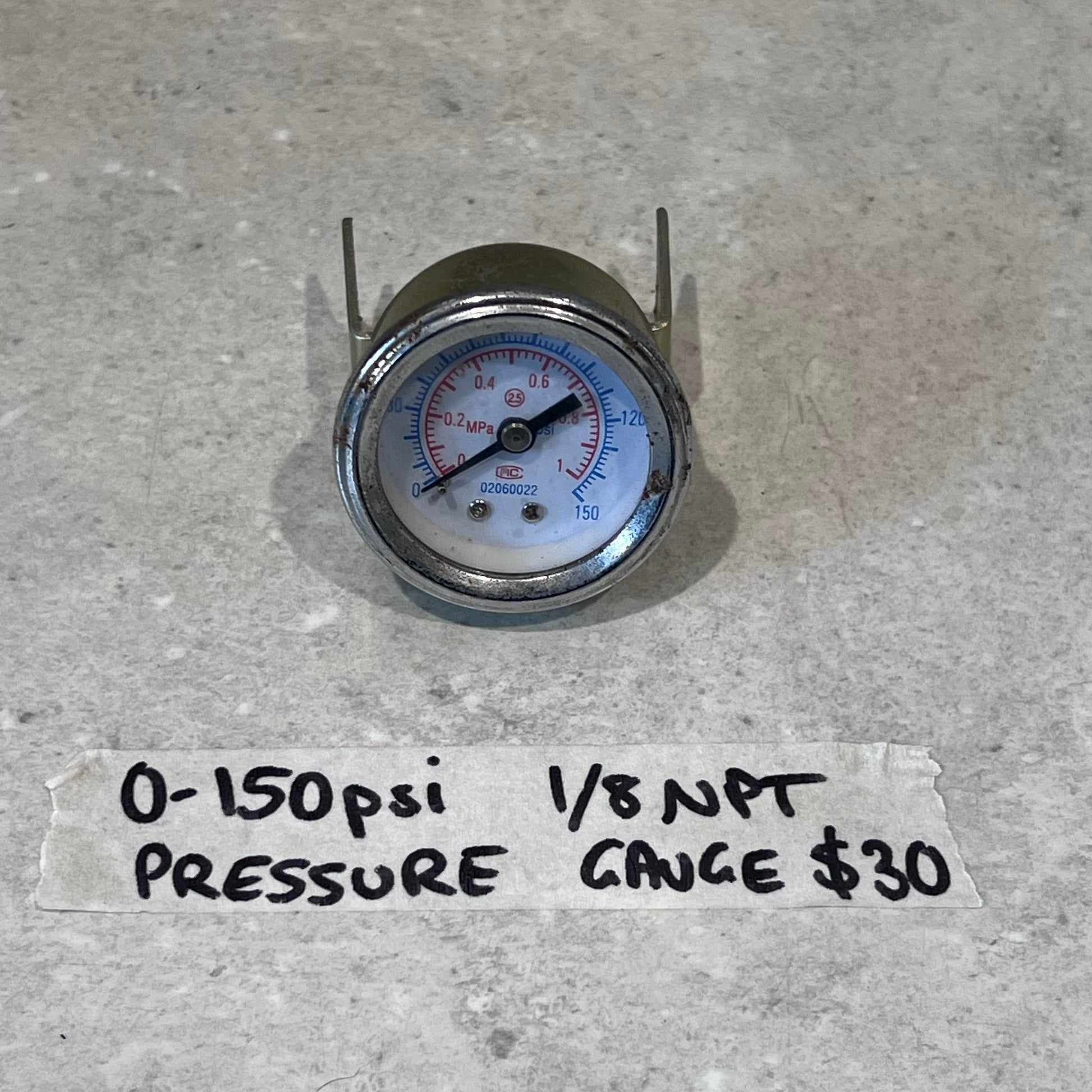0-150 psi pressure gauge with 1/8 NPT fitting for CUT50 plasma cutter, gauge displayed on gray surface with information label