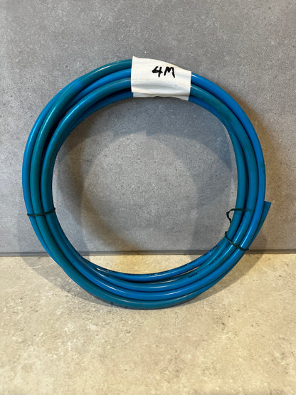 Coiled blue pneumatic hose with white tape labeled 4M