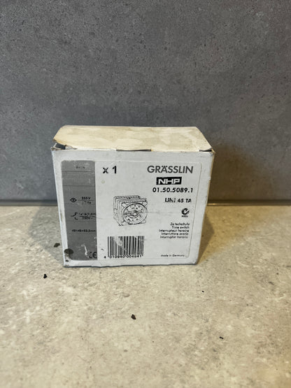 Box of Grässlin UNI 45 TA mechanical time switch with product details and barcode