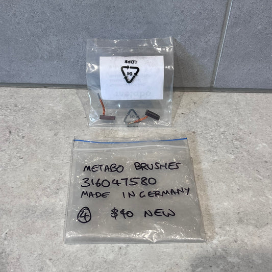 Two Metabo carbon brushes in a labeled plastic bag