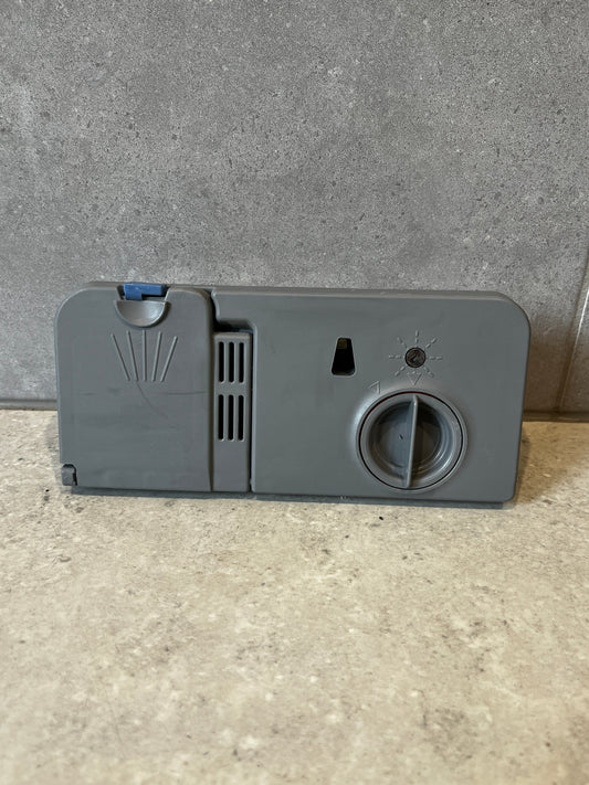 Front view of dishwasher detergent dispenser assembly with control dial