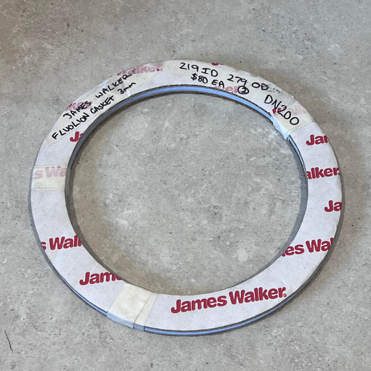 James Walker Fluolion gasket DN200 with labeling on a gray surface