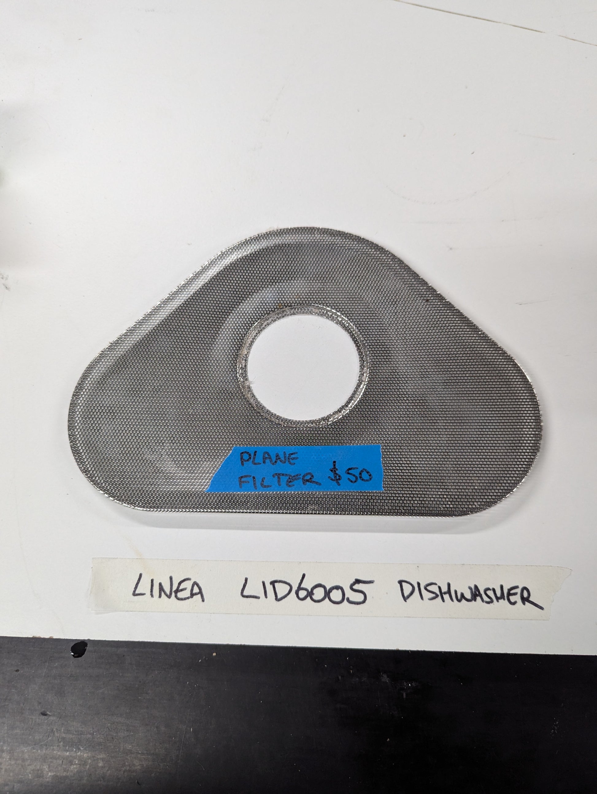 Linea LID6005 dishwasher stainless steel mesh filter on white surface