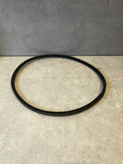 Motorcraft black engine drive belt on stone surface