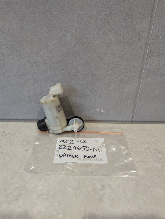 Automotive washer pump 224650-A1 shown with labeled plastic bag