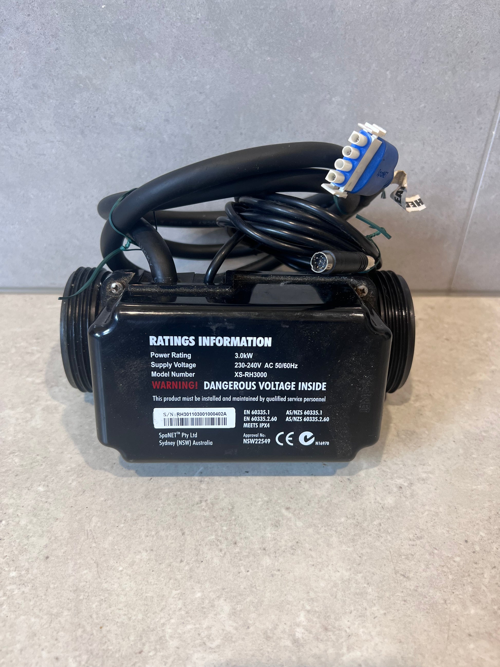 Back view of XS-RH3000 3.0kW spa heater displaying rating information and wiring