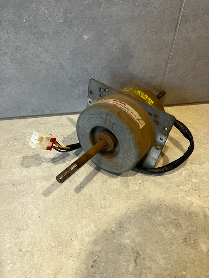 LG Electronics AC motor with mounting bracket and connected cable