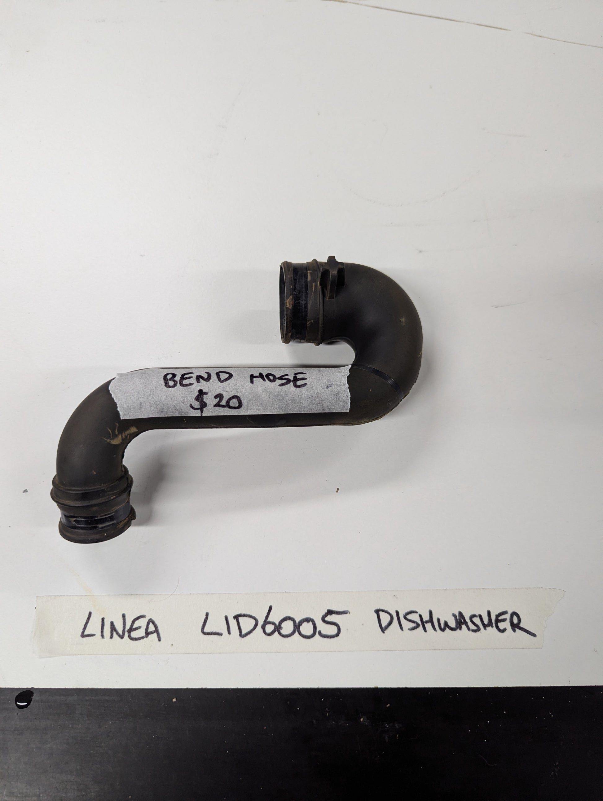 Linea LID6005 dishwasher bend hose on white surface