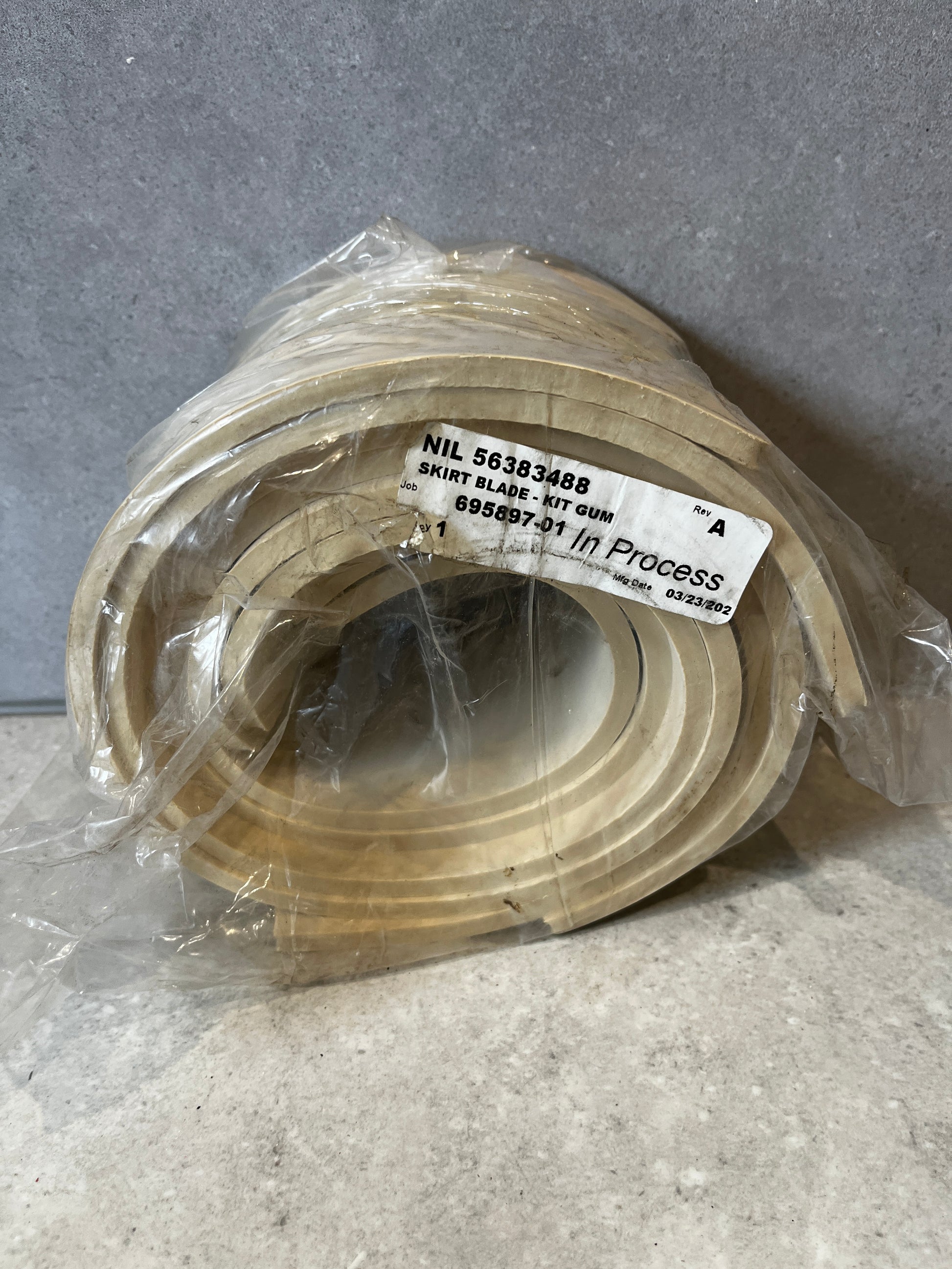 Coiled skirt blade kit gum replacement in packaging