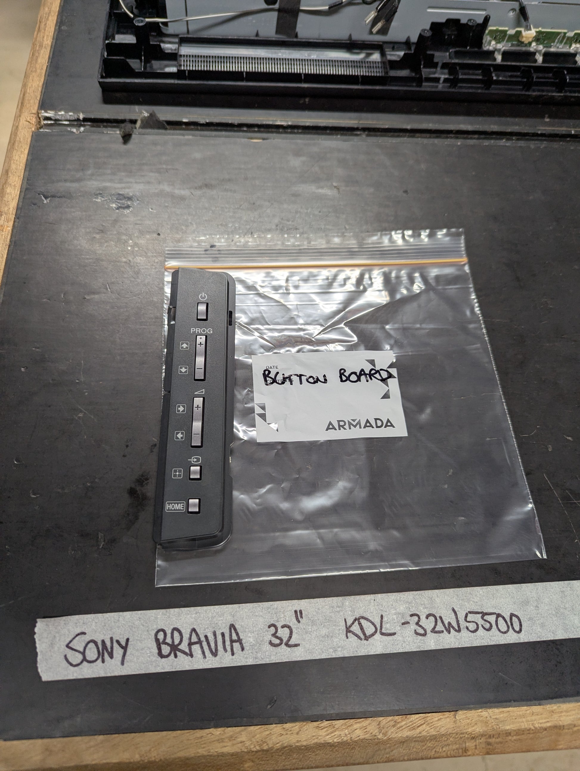 Sony Bravia KDL-32W5500 button board replacement part on a table