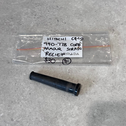 Hitachi 940-778 cord strain relief replacement part on gray surface