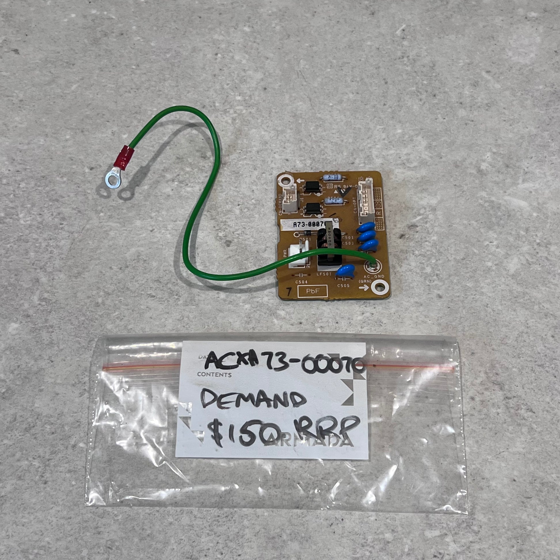 ACXA73-00070 circuit board with green ground wire and labeled bag
