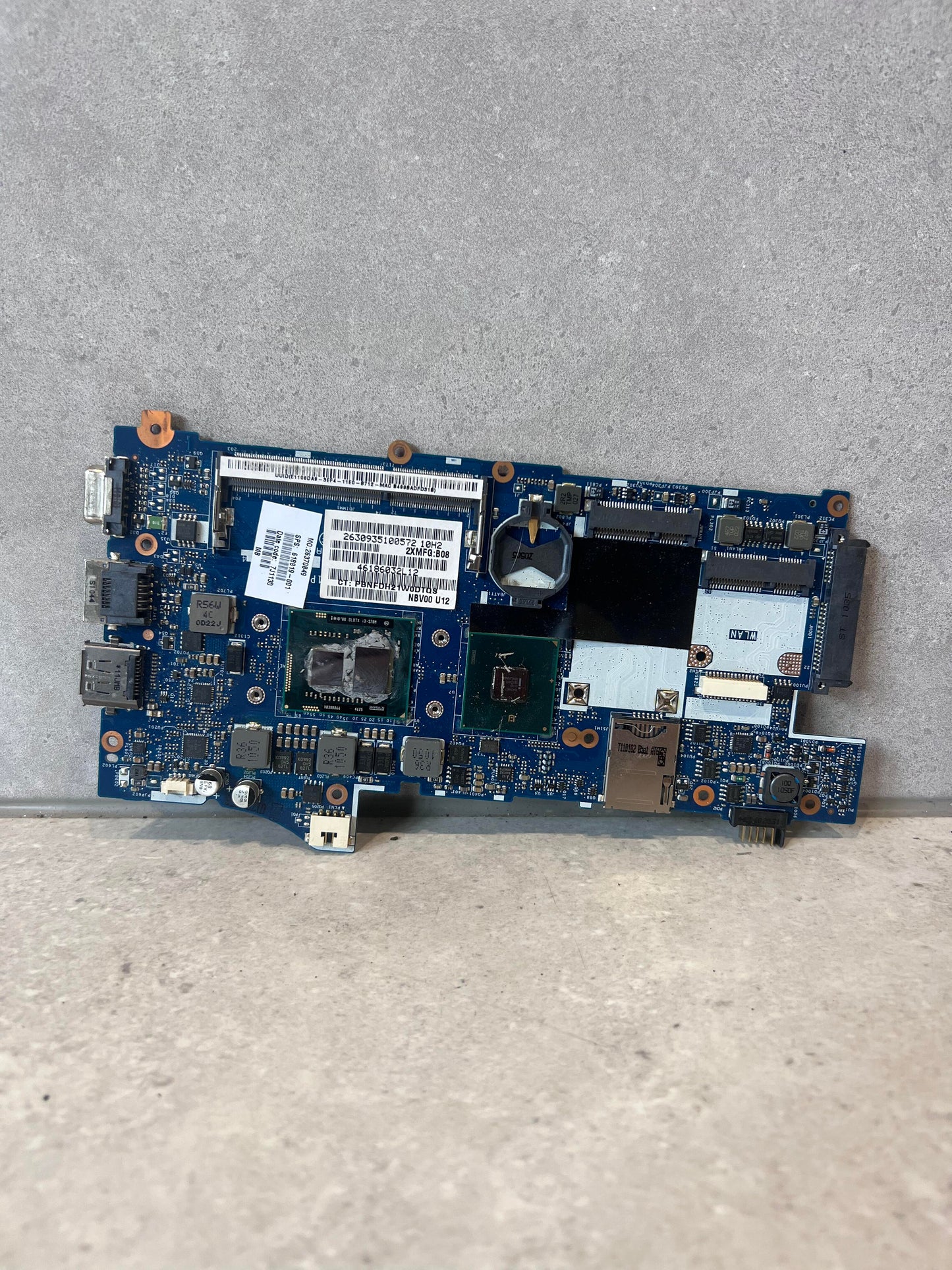 Top view of Lenovo LA-6161P laptop motherboard with visible ports and connectors
