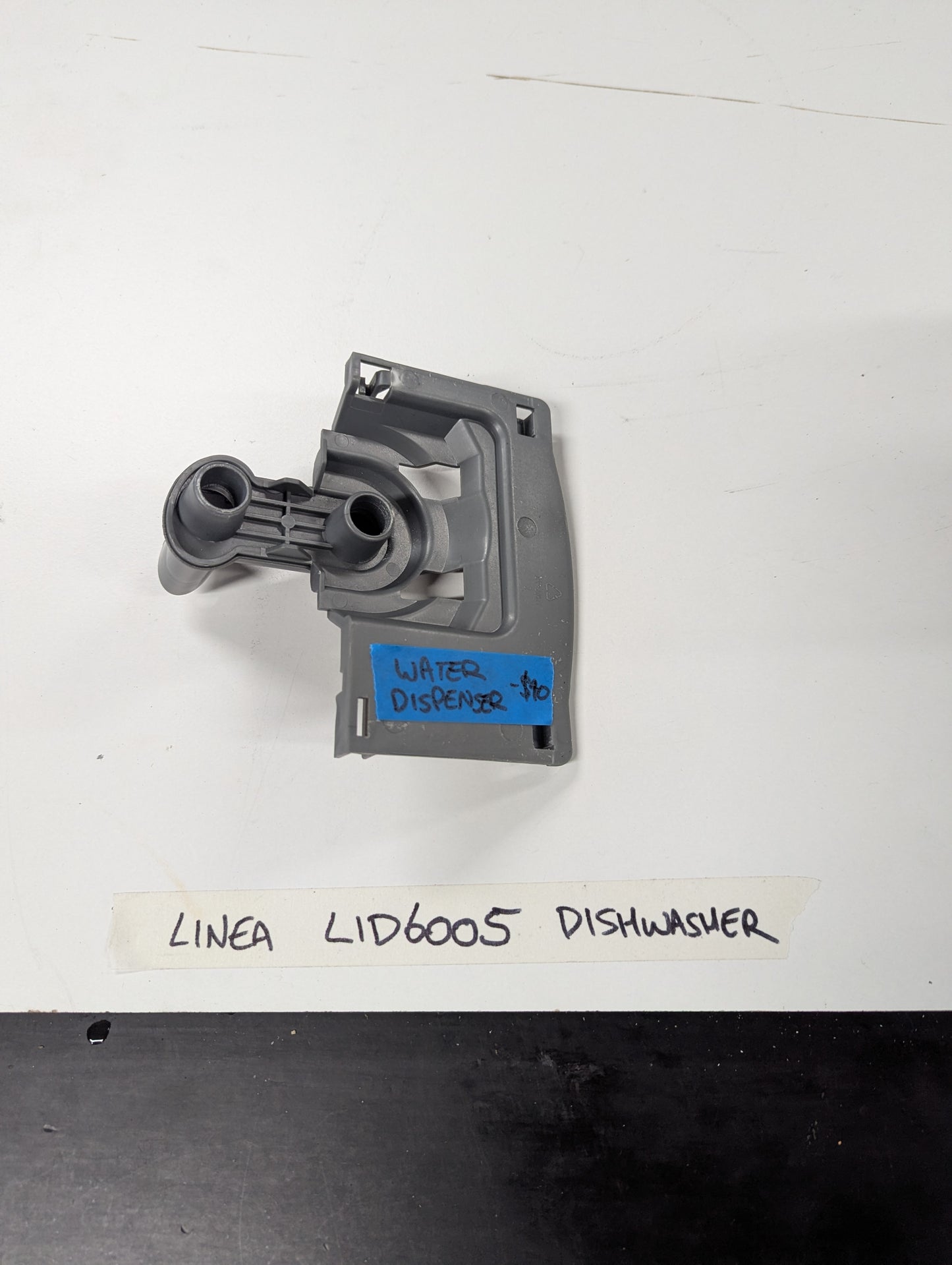 Linea LID6005 dishwasher water dispenser replacement part on white background