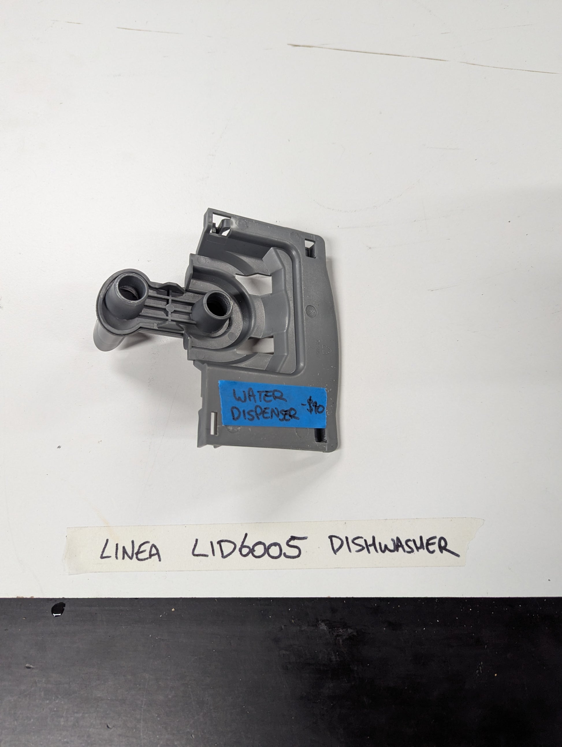 Linea LID6005 dishwasher water dispenser replacement part on white background