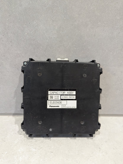 Front view of Panasonic EUDCN06 12V Capacitor Assembly with label visible