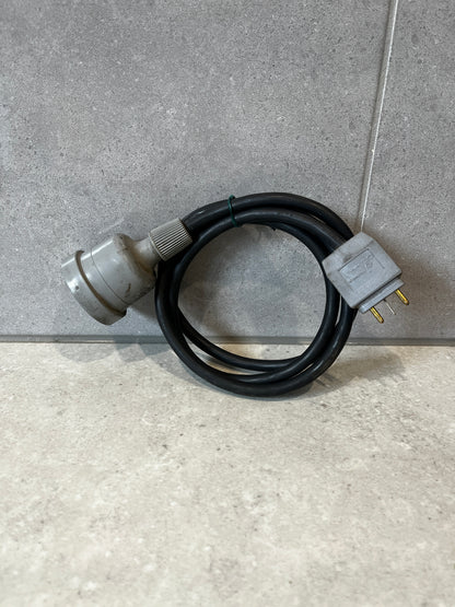 Indu Electric heavy-duty power cable coiled on a concrete surface