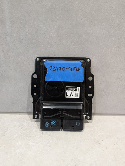 Front view of Nissan Engine Control Module 23740-4NL4A with housing and part label