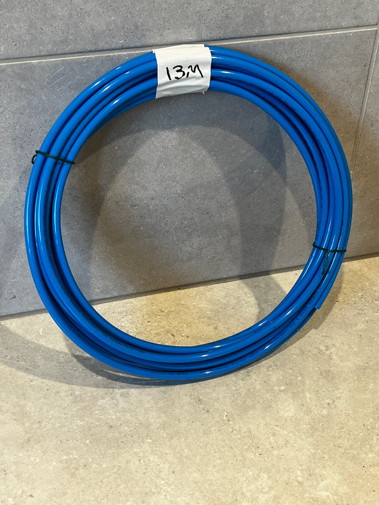 Coiled blue polyurethane tubing measuring 13.9 meters