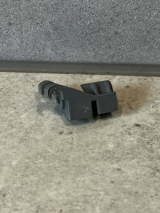 Durable plastic mounting clip with prongs and locking mechanism