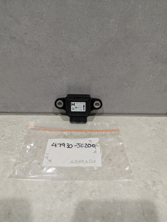 Nissan Armada yaw rate sensor 47930-JG200 with labeled zip bag