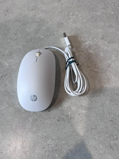 Top view of white HP wired USB optical mouse with USB cable