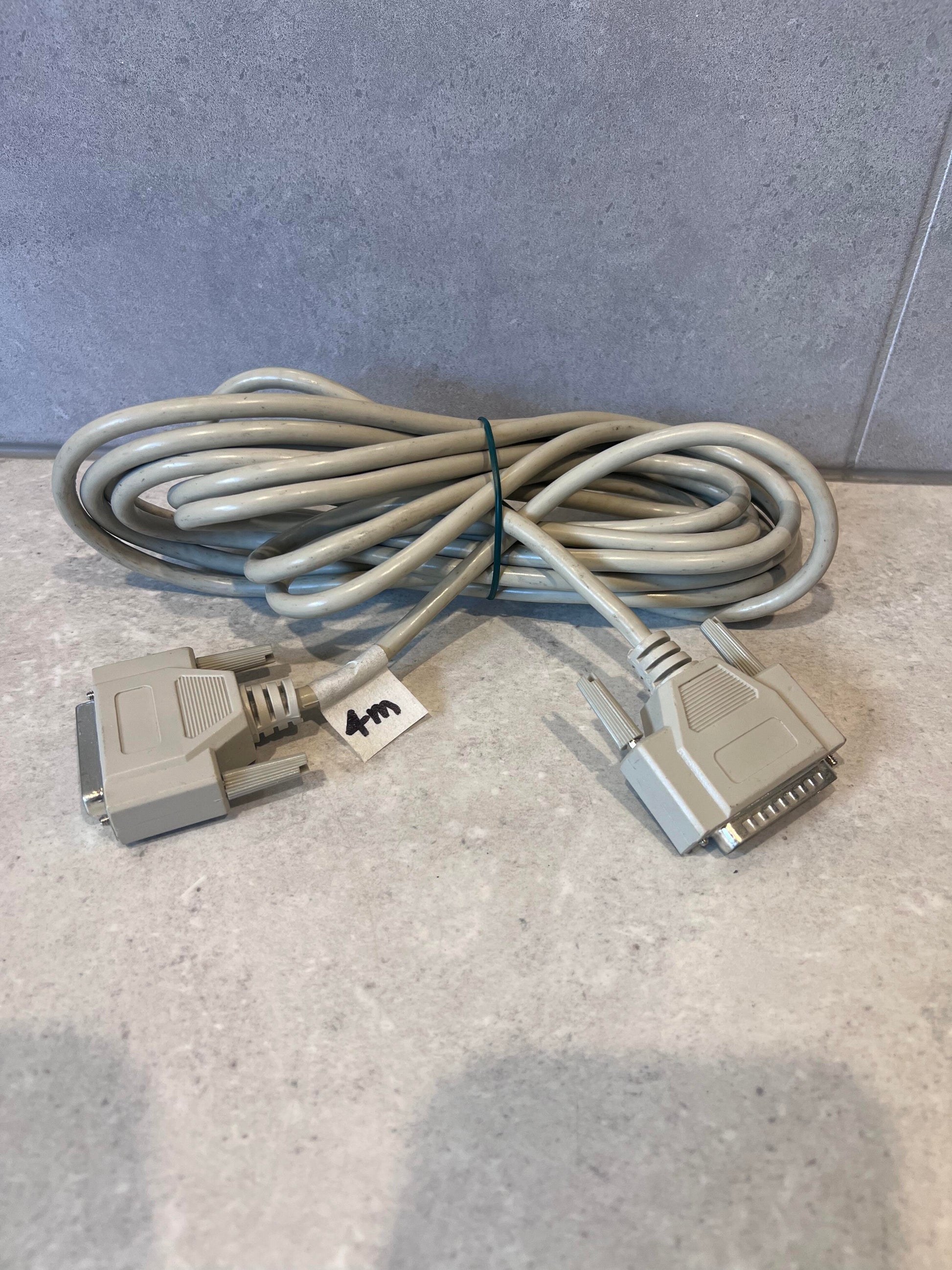 Coiled 4 meter DB25 serial cable with connectors on both ends