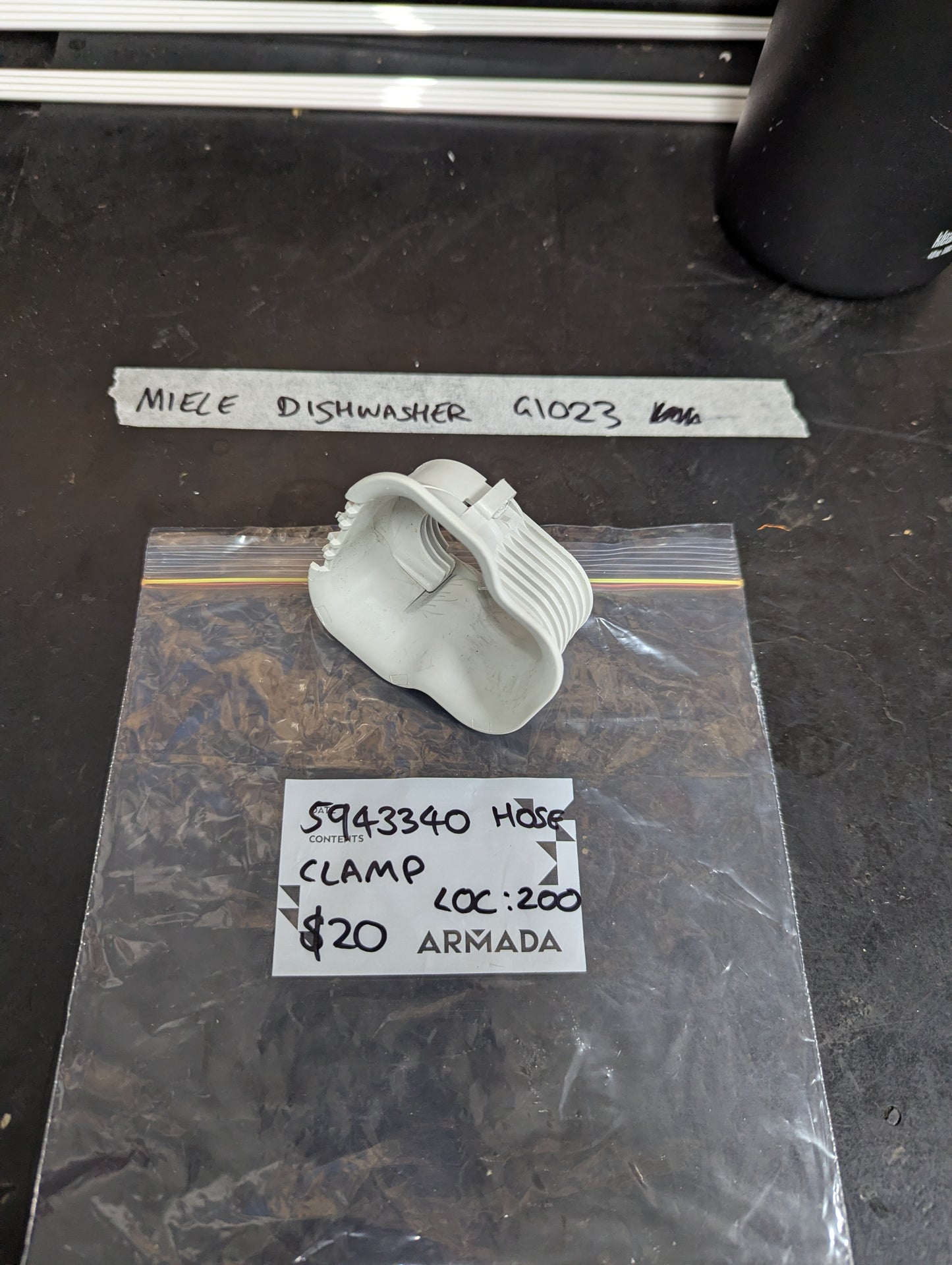 Miele G1023 dishwasher hose clamp on labeled bag