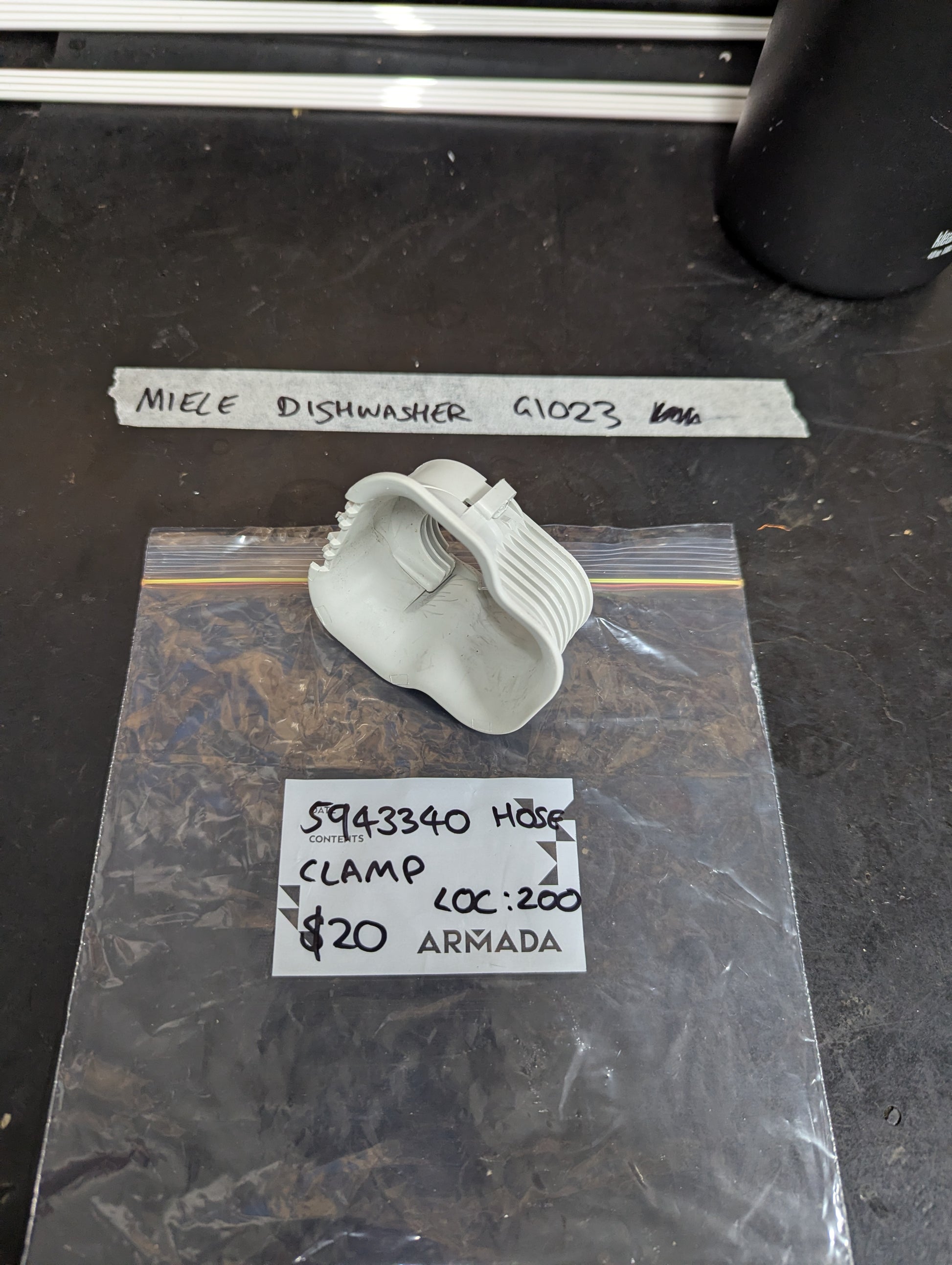 Miele G1023 dishwasher hose clamp on labeled bag