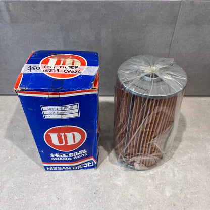 UD Nissan Diesel oil filter 15274-EP026 in box and plastic sleeve on counter