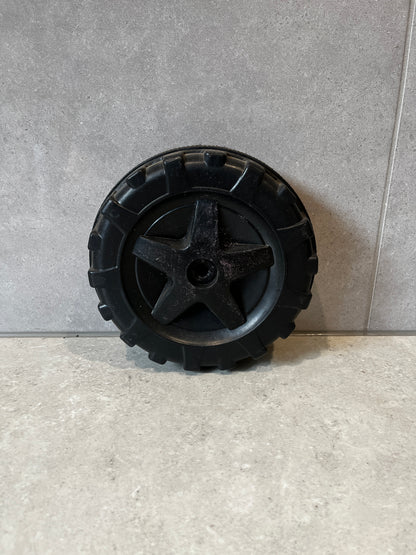 Black durable replacement wheel for garden cart with deep tread pattern