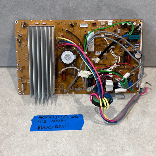 Main PCB board ACXA73C55210R with connectors and heat sink on a flat surface