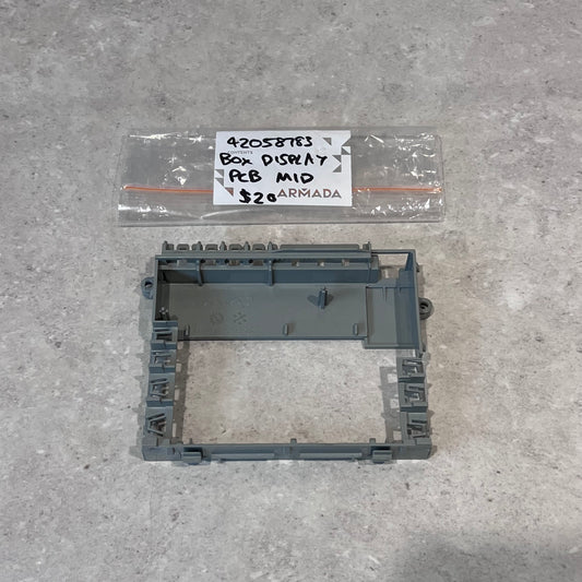 Gray plastic box display PCB mid frame with labeled bag on gray surface