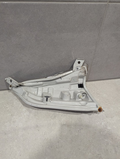Rear view of left side marker light assembly showing mounting points