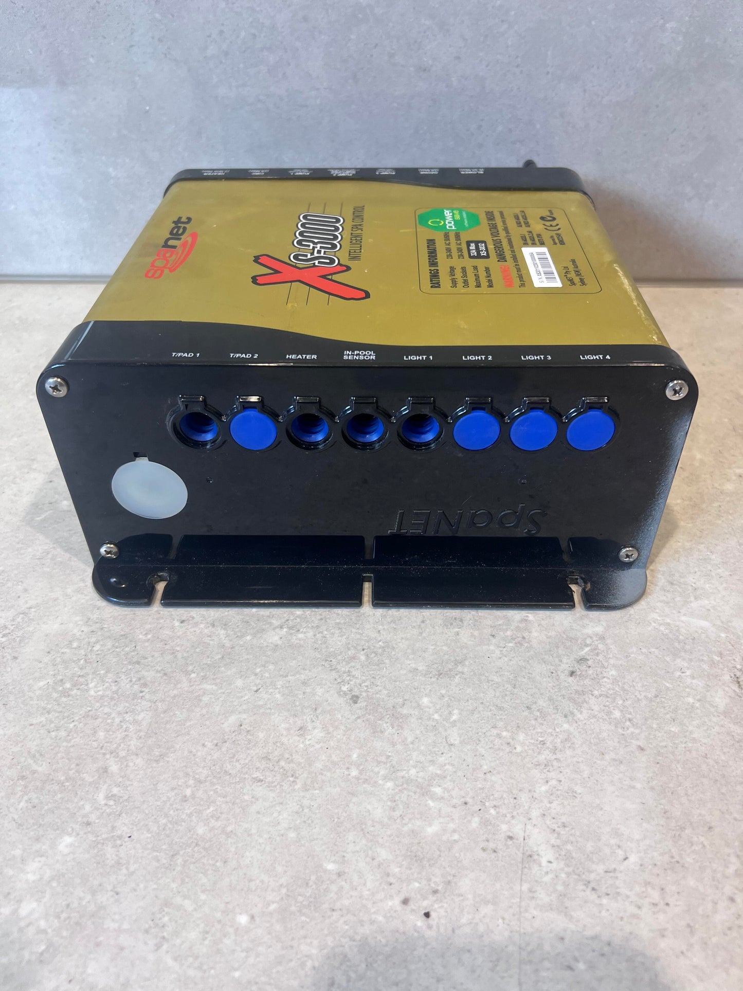 Side view of SpaNet XS-3000 Intelligent Spa Controller with blue connection ports