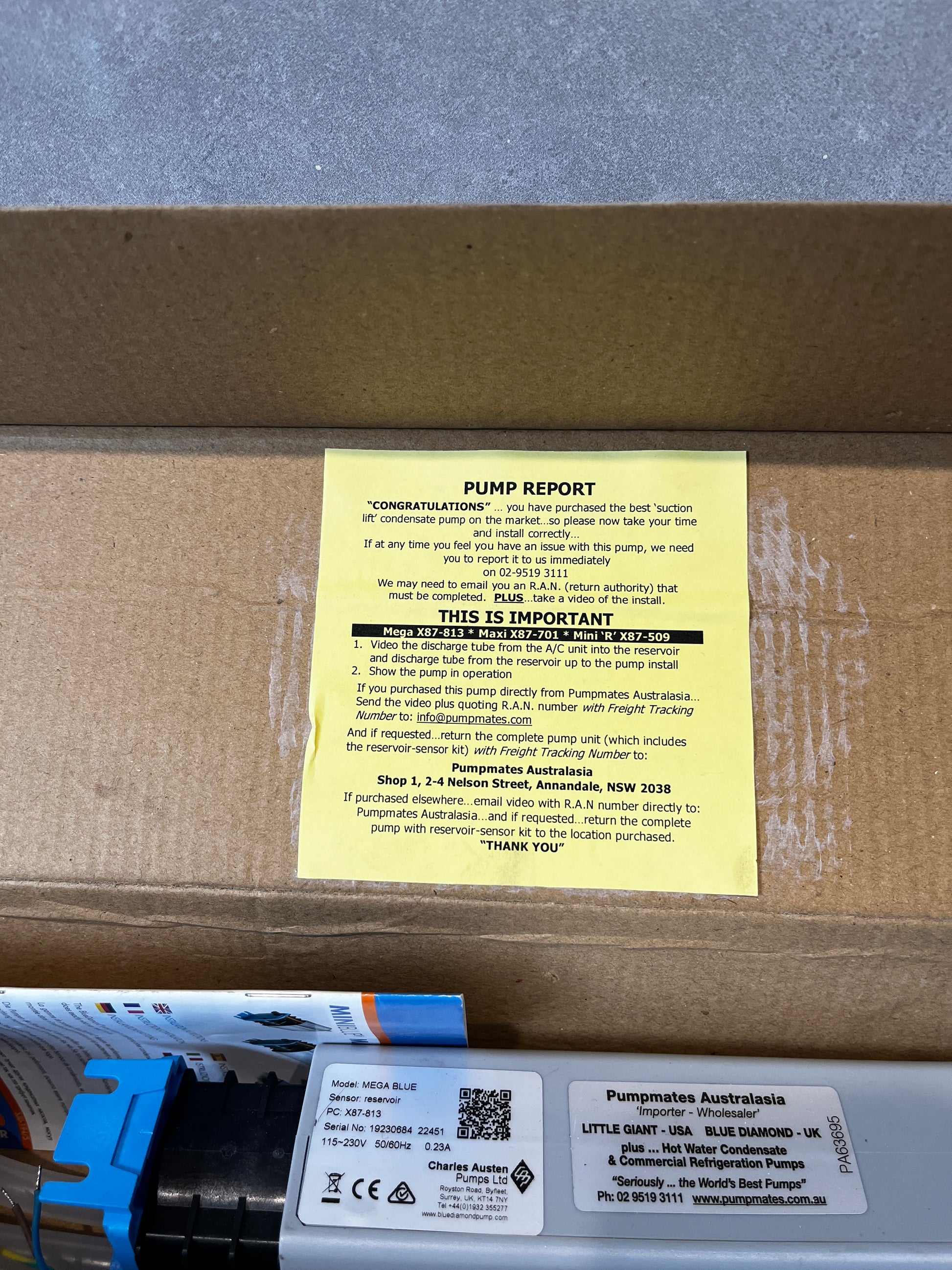 Close-up of MegaBlue pump kit instructions and product label