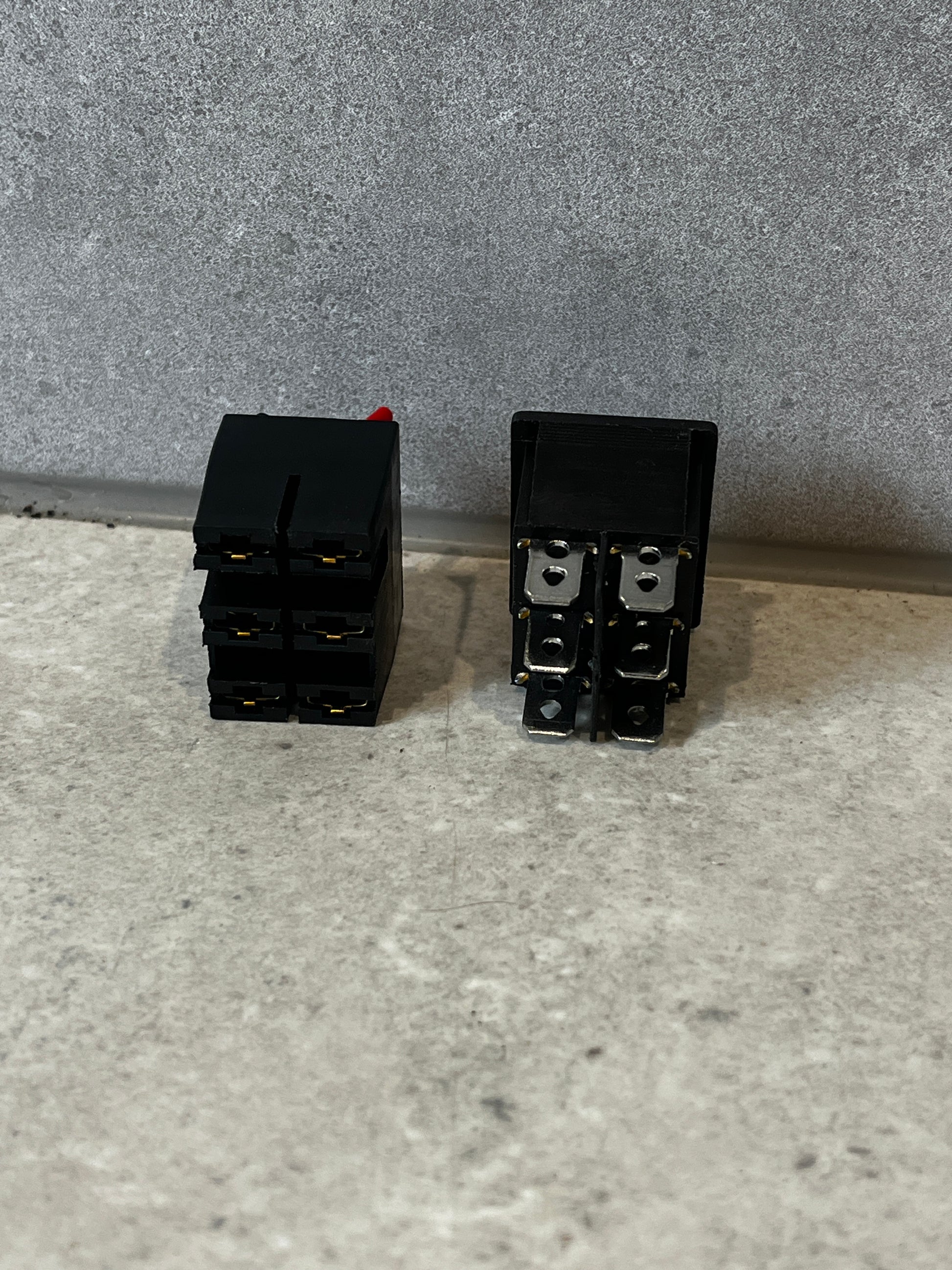 Forward reverse stop rocker switch showing terminal connections and mounting side.