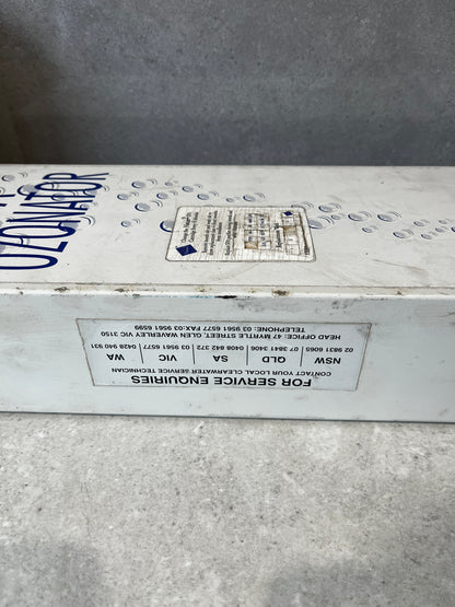 Closeup of Clearwater spa ozonator service label and company details