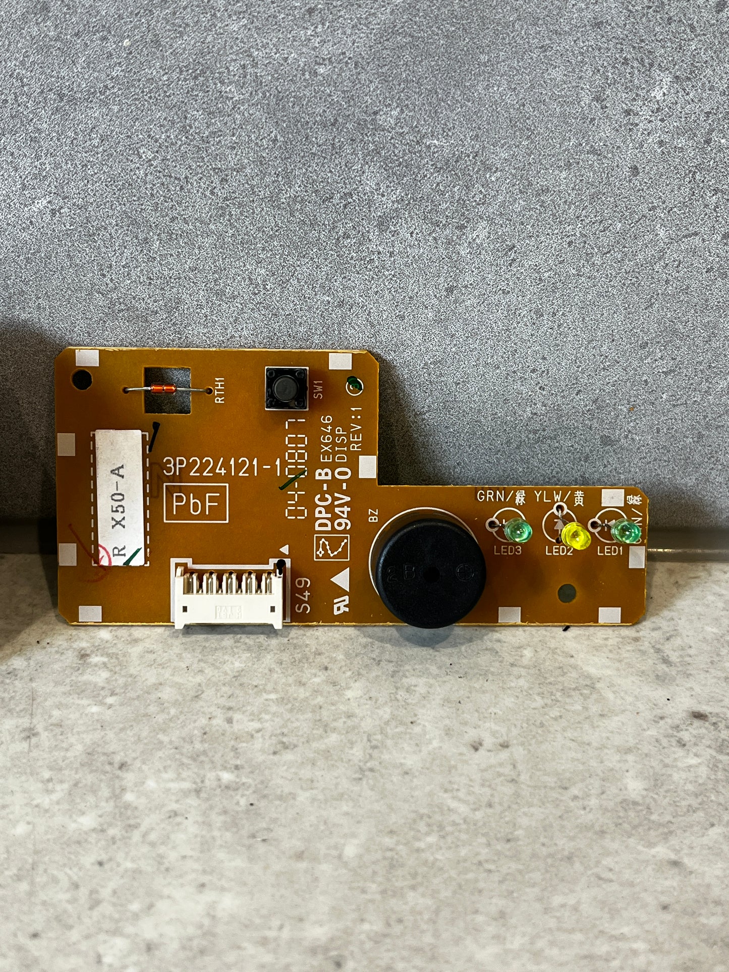 Close-up of Daikin printed circuit board assembly with LEDs