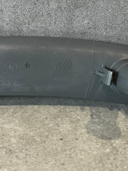 Closeup of dishwasher spray arm showing polypropylene material code