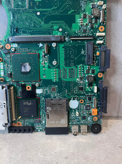Close-up of motherboard section showing Intel chipset and connectors