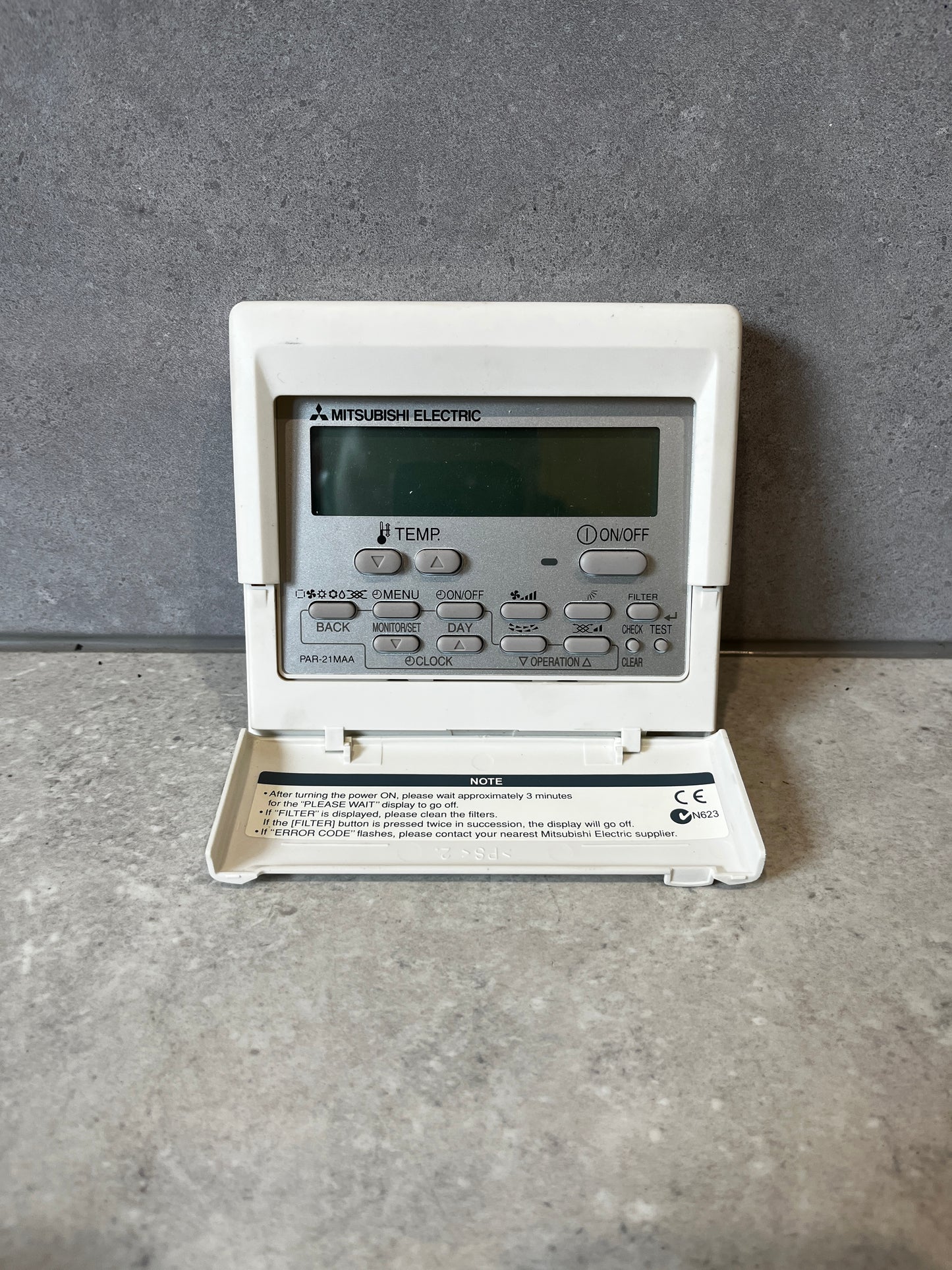 Front view of Mitsubishi Electric PAR-21MAA HVAC remote controller with display and buttons