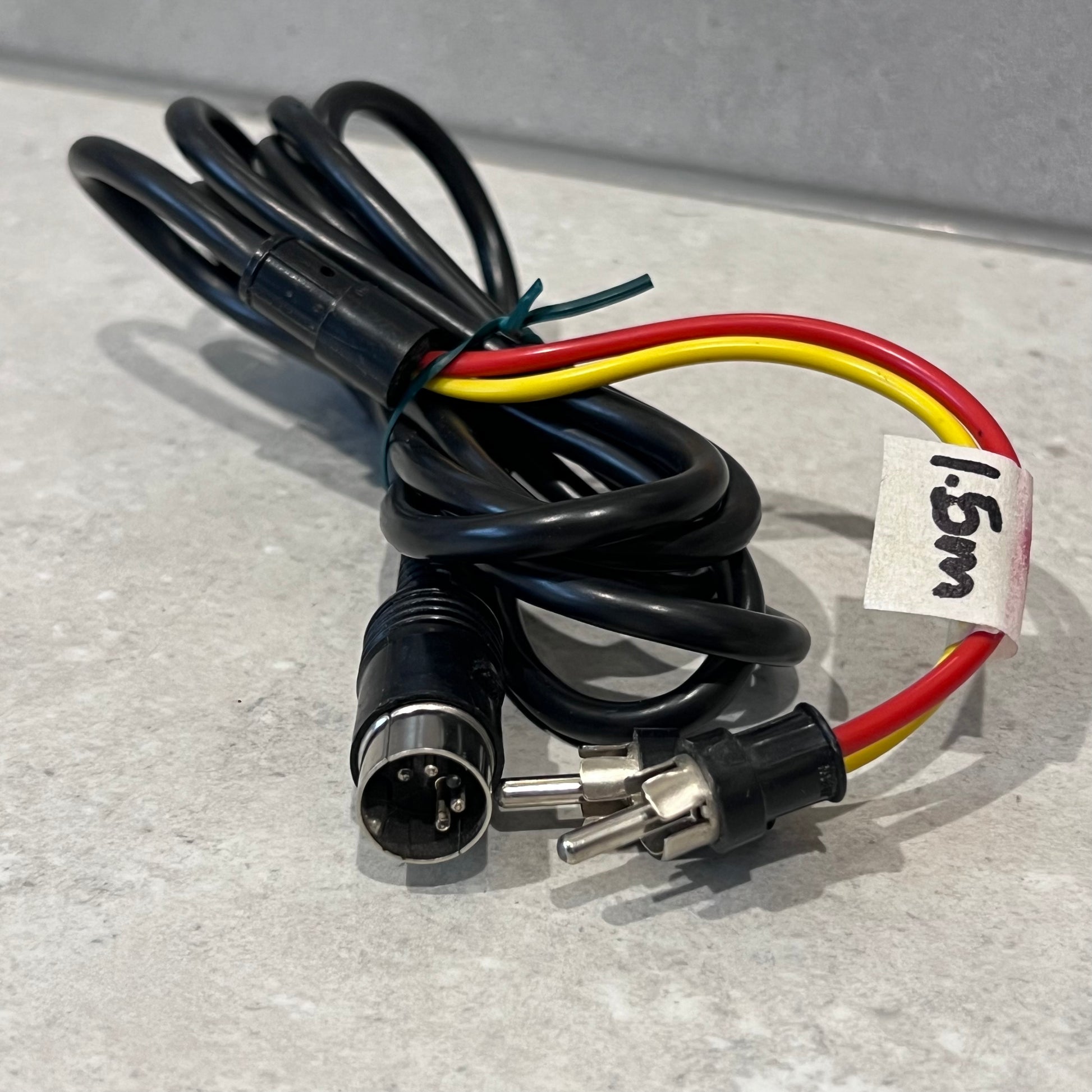 Close up of 5 Pin DIN to 2 RCA cable showing connectors and 1.5m label