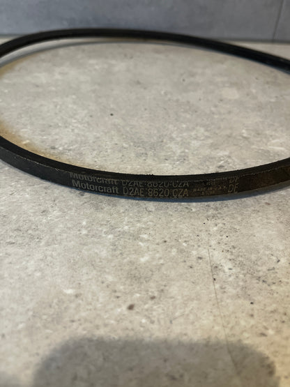 Close-up of Motorcraft D2AE-8620-CZA engine drive belt showing branding and part number