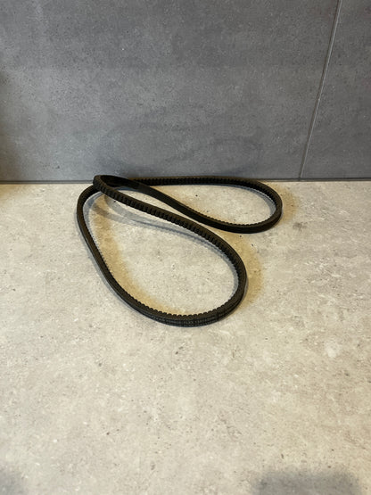 Goodyear Torque-Flex V-belt folded in a loop on gray background