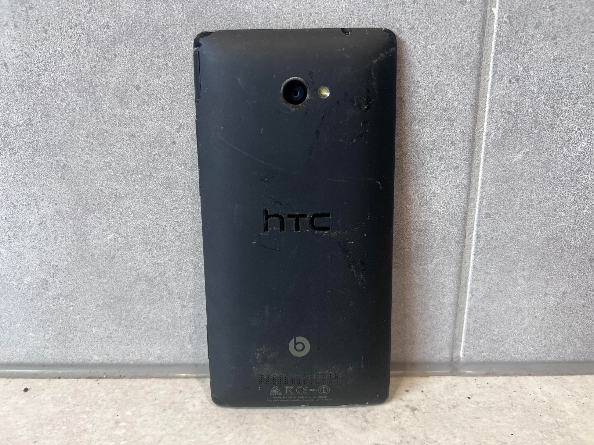 Back view of HTC smartphone with HTC and Beats Audio logos