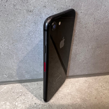 Side view of black Apple iPhone 8 showing volume and mute buttons
