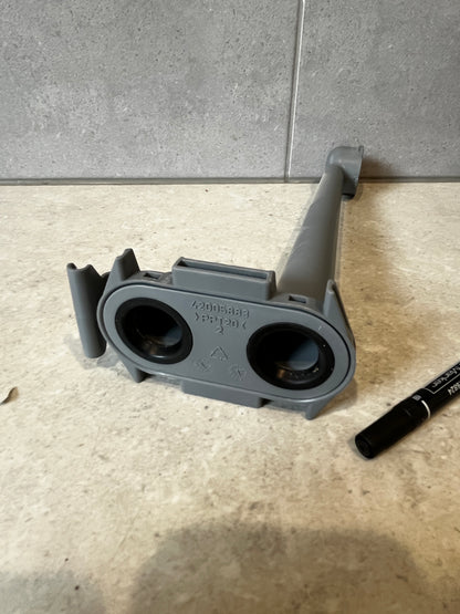 Base view of dishwasher lower spray arm support showing connection points