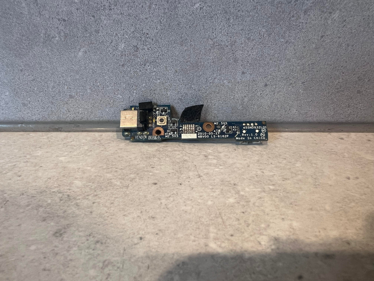 Close-up view of laptop USB port replacement circuit board