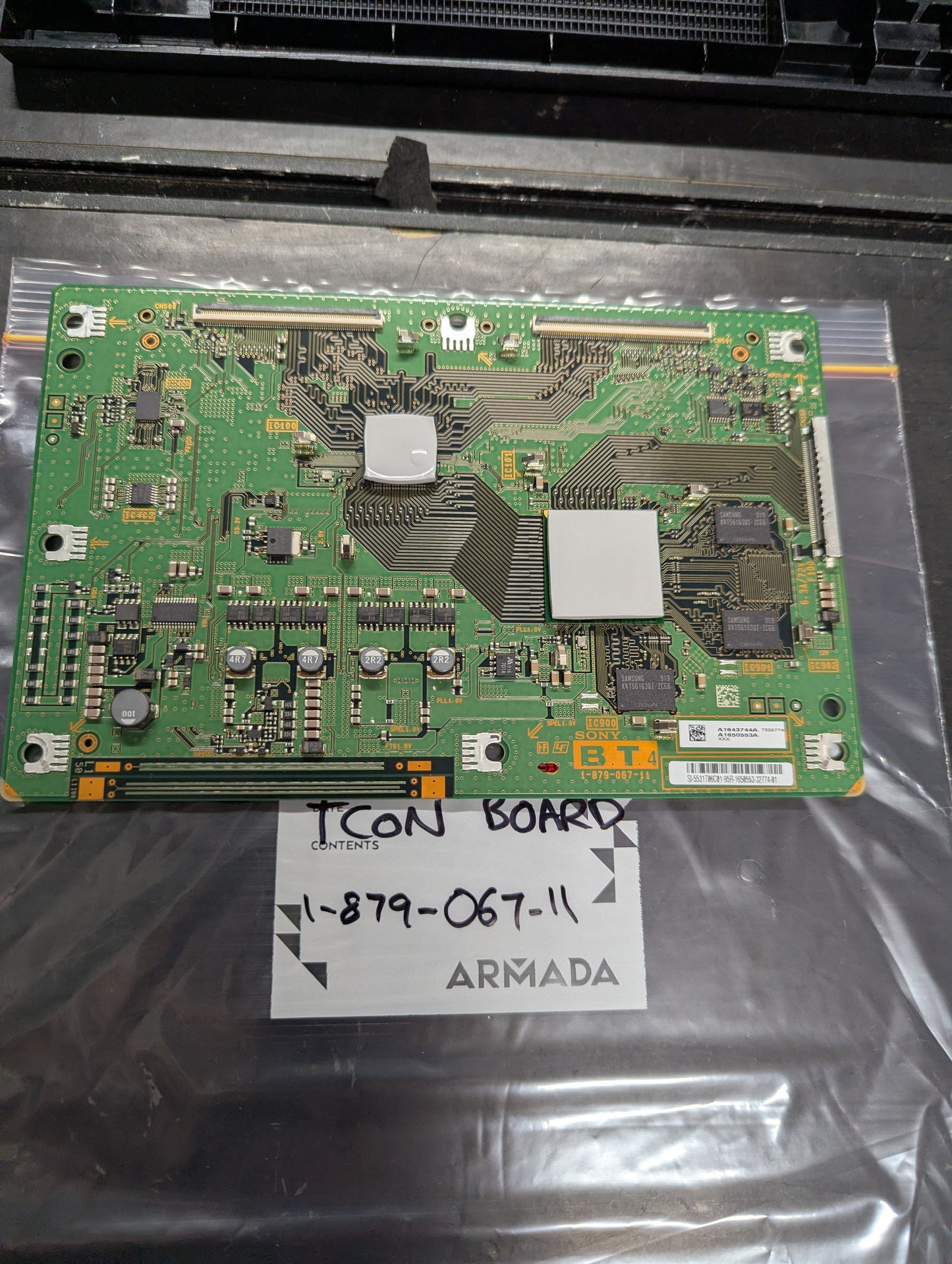 Close-up of Sony TCON board 1-879-067-11 for Bravia 32-inch KDL-32W5500 on anti-static packaging